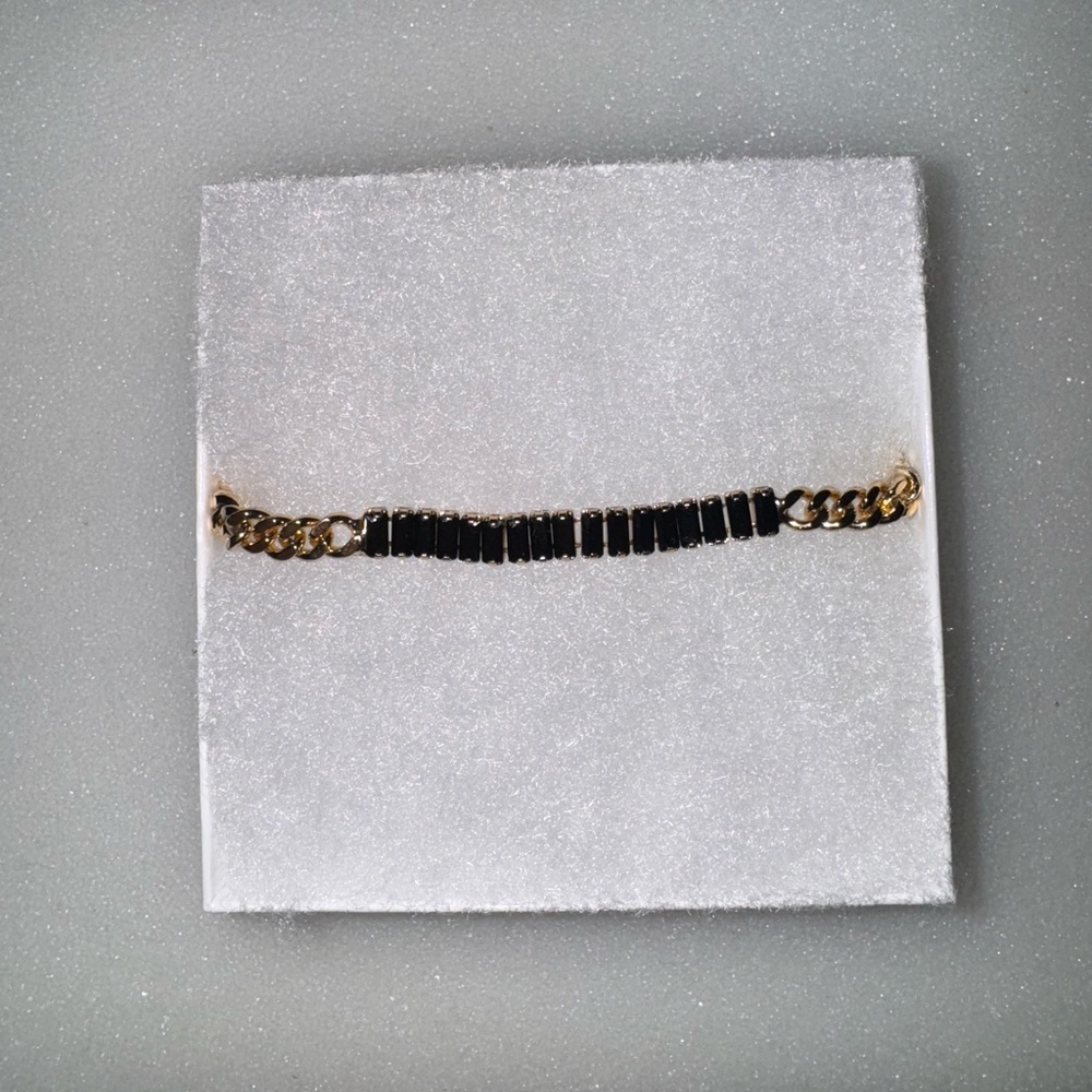 Elegant Black and Gold Bracelet
